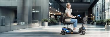 Invacare Colibri elscooter enkel montera isär hög komfort lätthanterlig skoter färgglad promenadskoter
