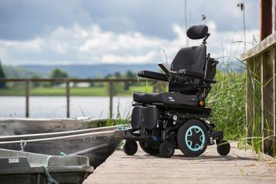 Invacare TDX SP2 ULM elrullstol inomhus utomhus mitthjulsdriven hjälpmedel permobil sittproblematik