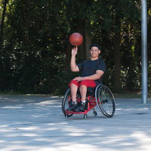 Sport wheelchair Top End Pro 2 man playing basketball