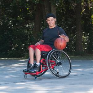 Sport wheelchair Top End Pro 2 man playing basketball